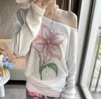 White and pink hibiscus knit