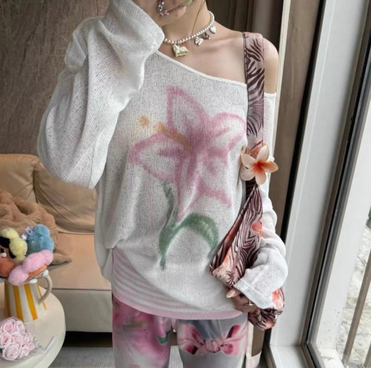 White and pink hibiscus knit
