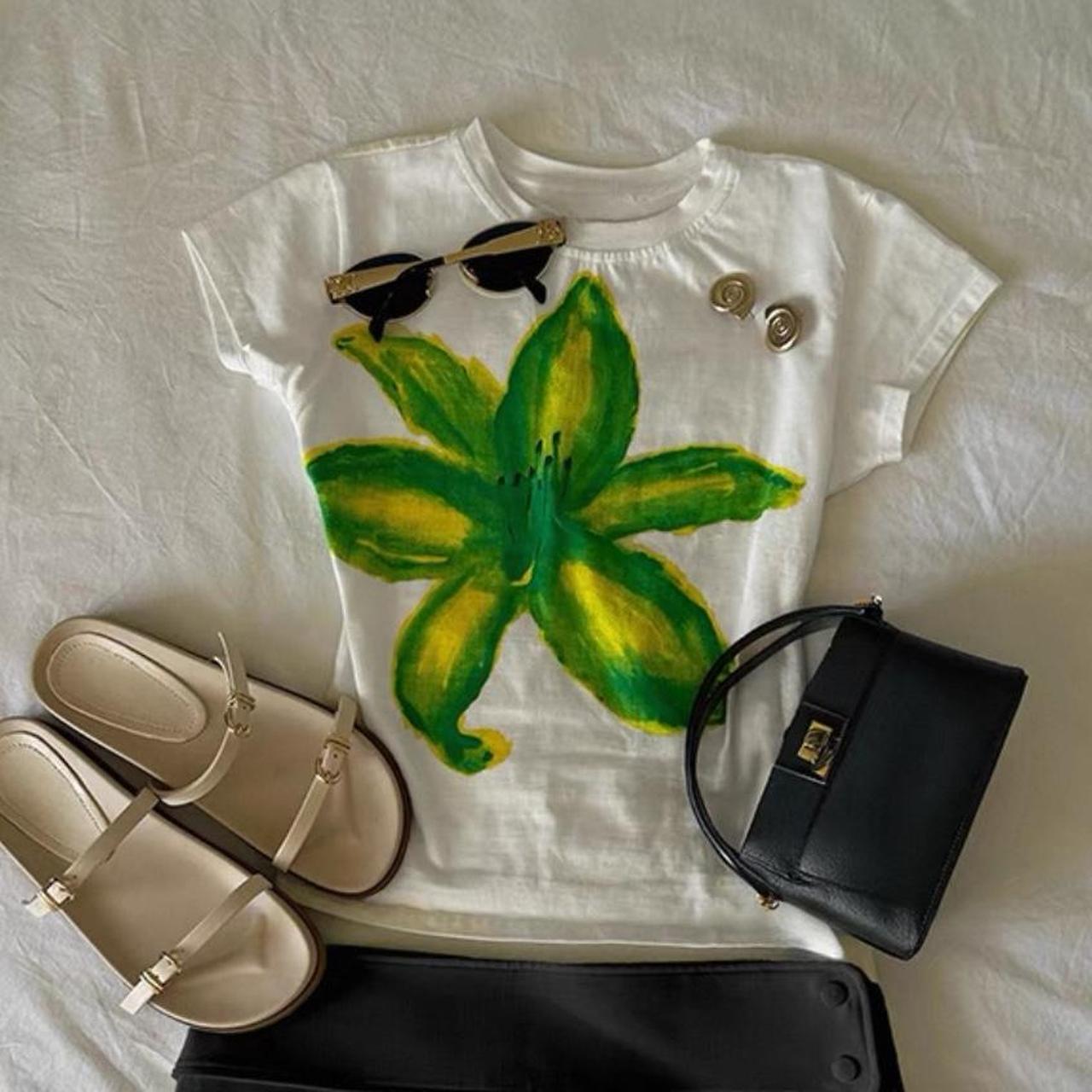 White and green hibiscus graphic crop top
