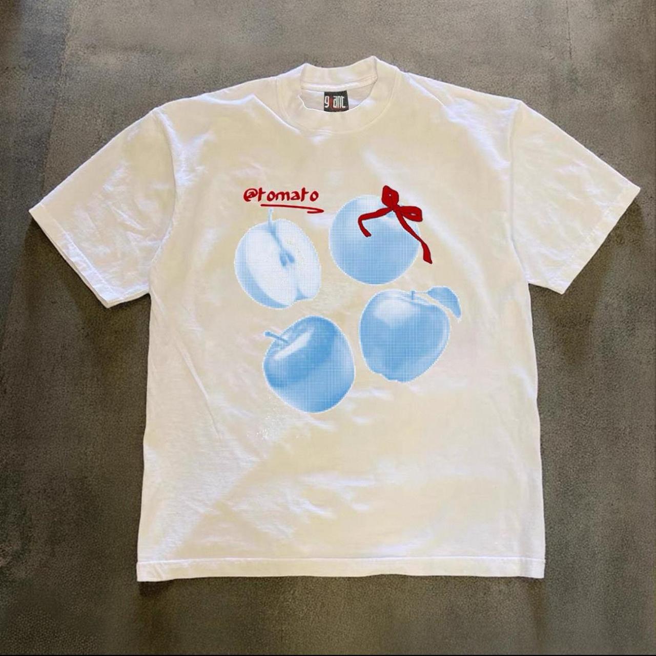 Red ribbon apple tee