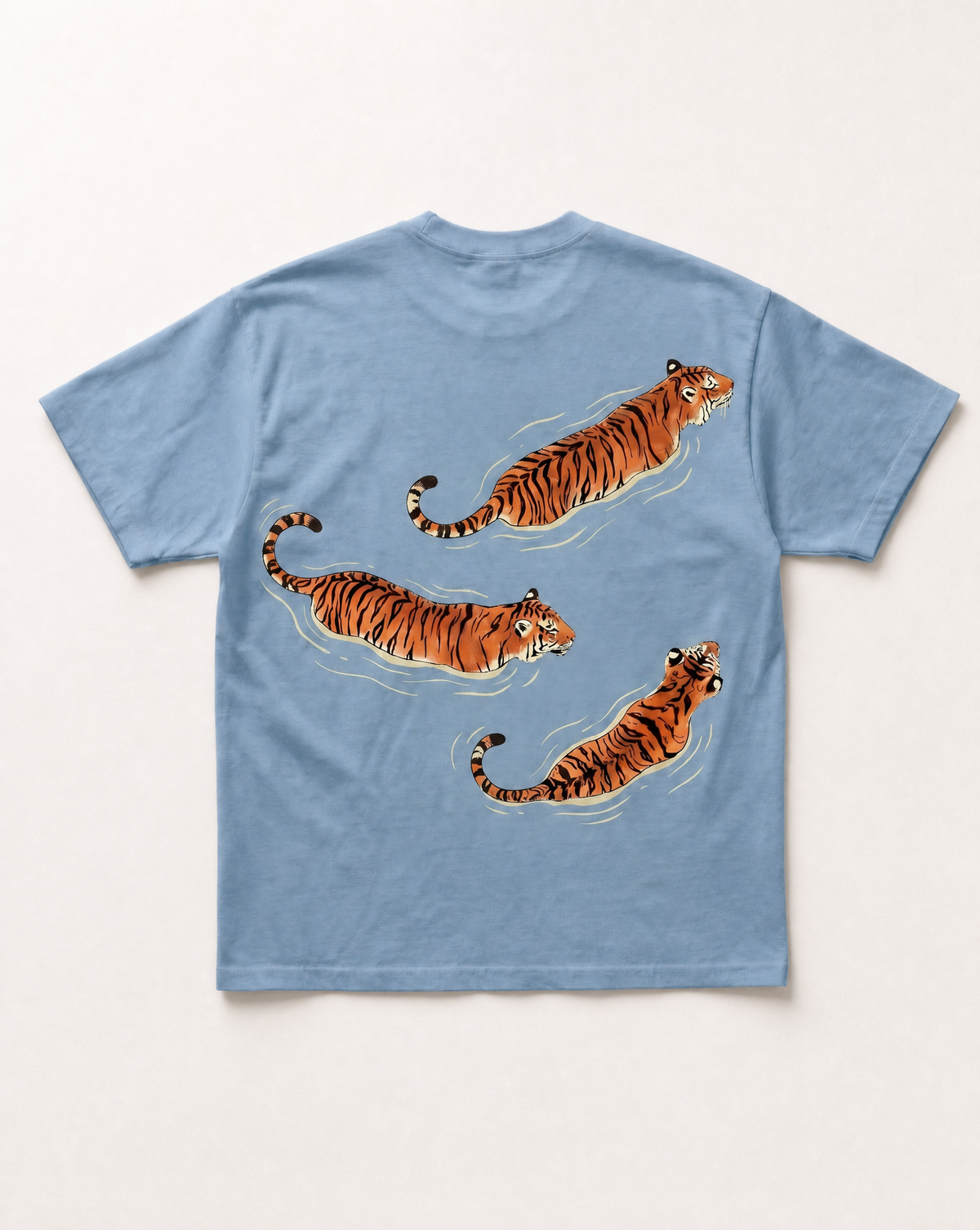 Baby blue Swimming tigers heavyweight tee